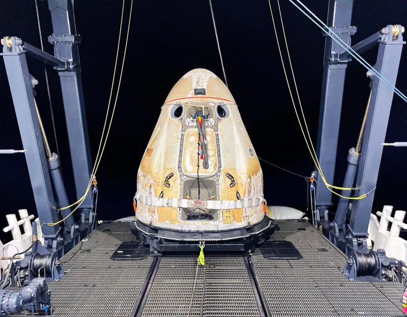 A Dragon cargo capsule recovered on a ship after returning from the ISS (NASA)