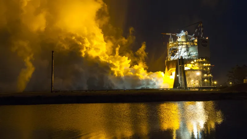 A rocket engine test firing at night (NASA)